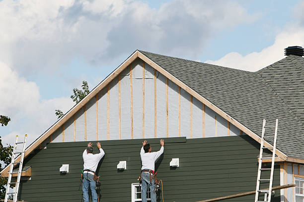Professional Siding technician working in Lincoln, MA
